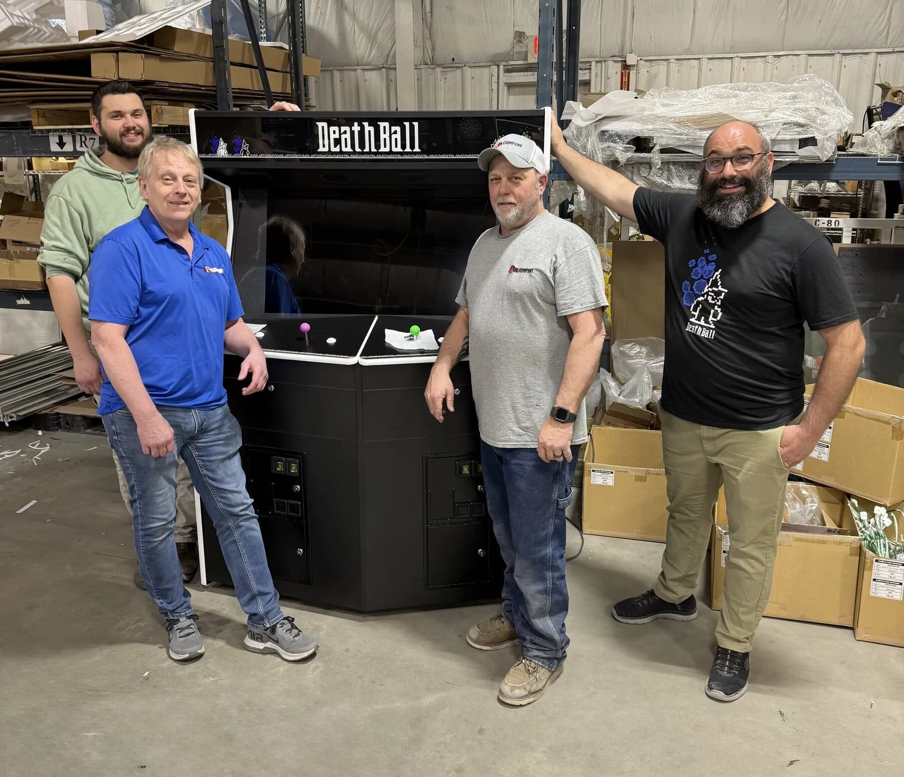 The Fun Company team with a finished DeathBall cabinet